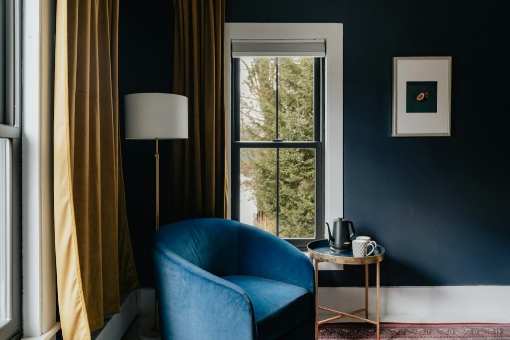 Armchair beside a window in a cozy corner