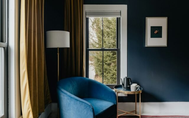 Armchair beside a window in a cozy corner