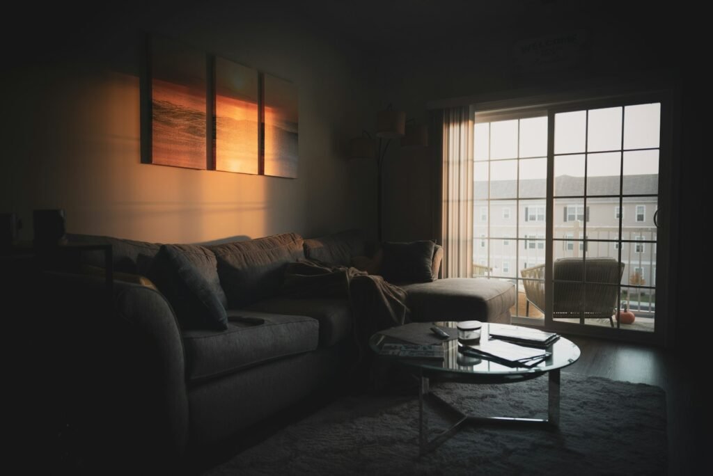 Living room with sofa and warm evening lighting