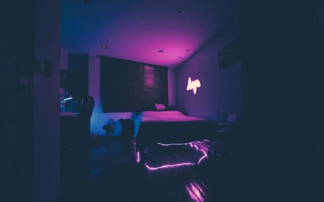 LED strip lights glowing in a bedroom