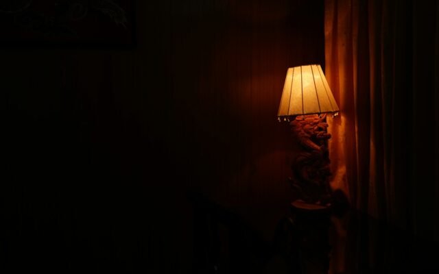 Warm lamp glowing in a dim room